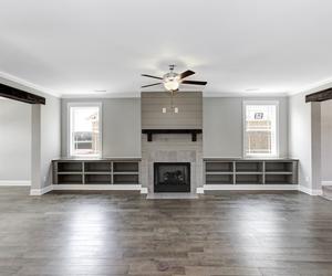 Fireplace with built ins surrounding