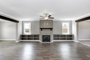 Fireplace with built ins surrounding
